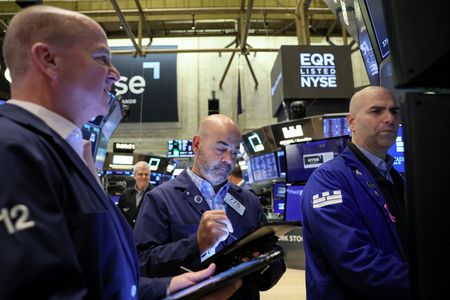 Wall St ends down slightly; investors await Friday’s payrolls