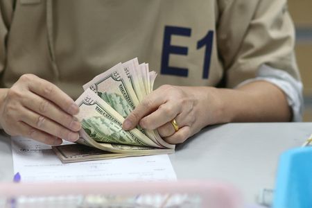 Dollar regains ground after sell off; bitcoin breaches $42,000