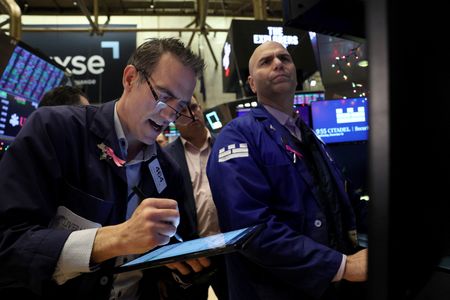 Stocks edge up, bond yields dip as investors mull ‘soft landing’
