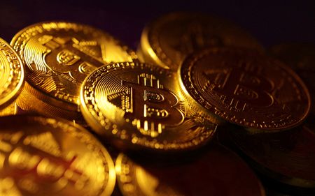 Bitcoin near 21-month high after US regulators approve ETFs
