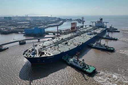 Oil near flat as extreme cold’s hit to U.S. output offsets China data