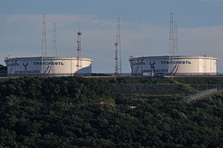 Oil prices roughly flat as unclear demand scenario weighed