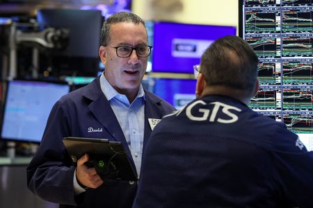 Wall St muted after hot inflation data douses early rate-cut hopes