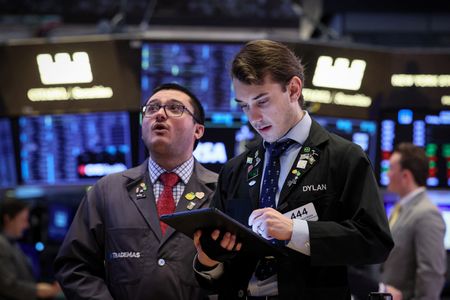 Equities close slightly lower as focus shifts to data